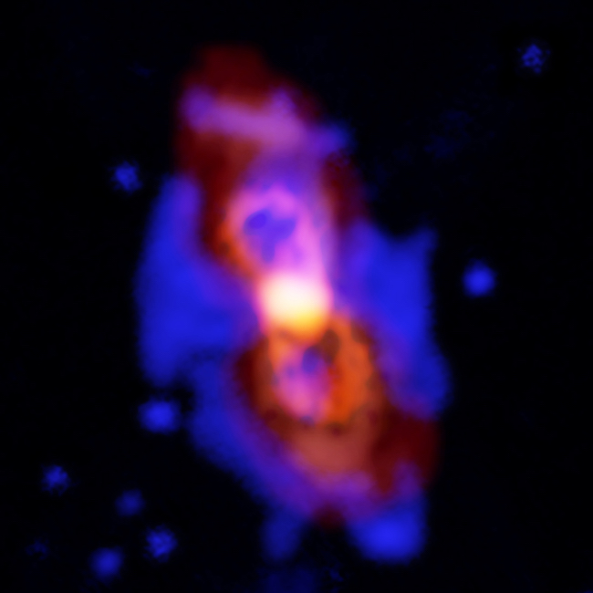 Citra CK Vul, tabrakan dua bintang yang menghasilkan bintang baru. Para astronom menemukan molekul radioaktif pada sisa tabrakan ini. Kredit: ALMA (ESO/NAOJ/NRAO), T. Kamiński & M. Hajduk; Gemini, NOAO/AURA/NSF; NRAO/AUI/NSF, B. Saxton